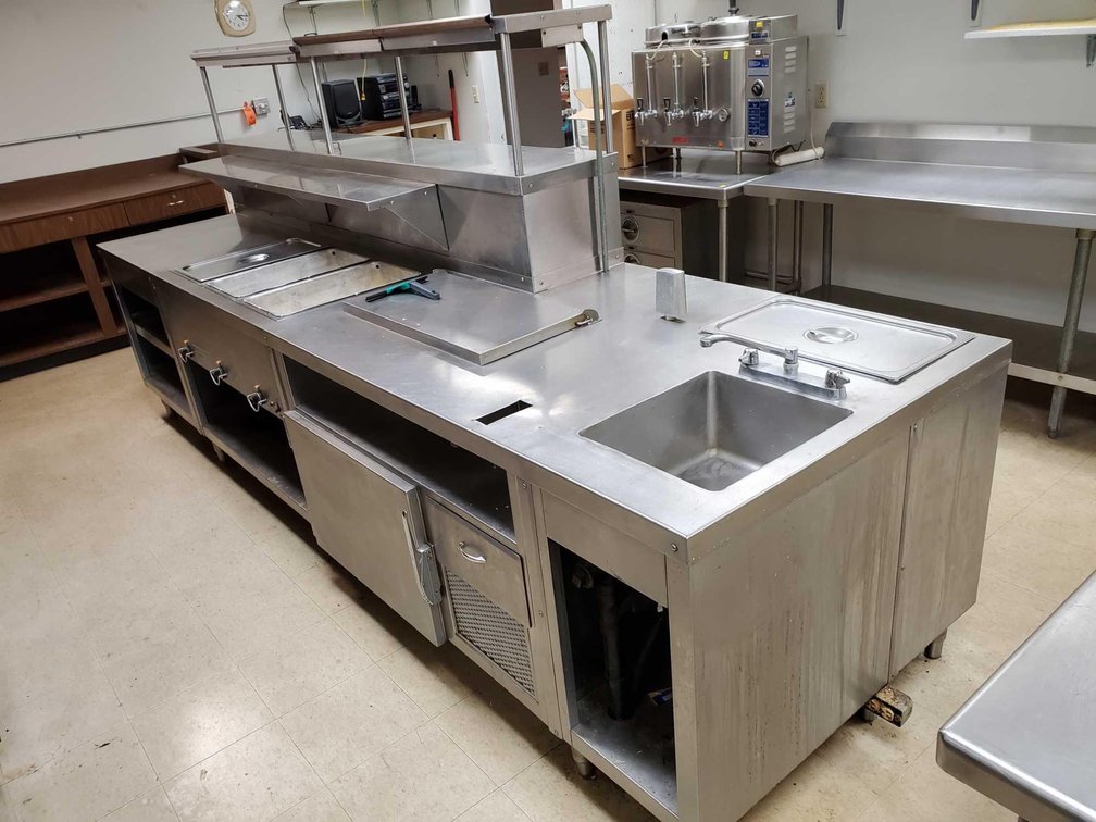 LARGE NSF RATED COMMERCIAL FOOD PREP CENTER W/SHELVES, WARMING STATION, COOLER, STEAM TABLES, AND ST
