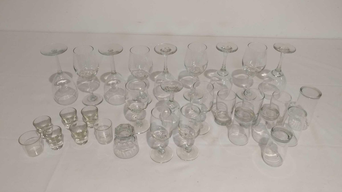 VARIETY OF GLASSWARE WINE GLASSES, SHOT GLASSES, AND MORE