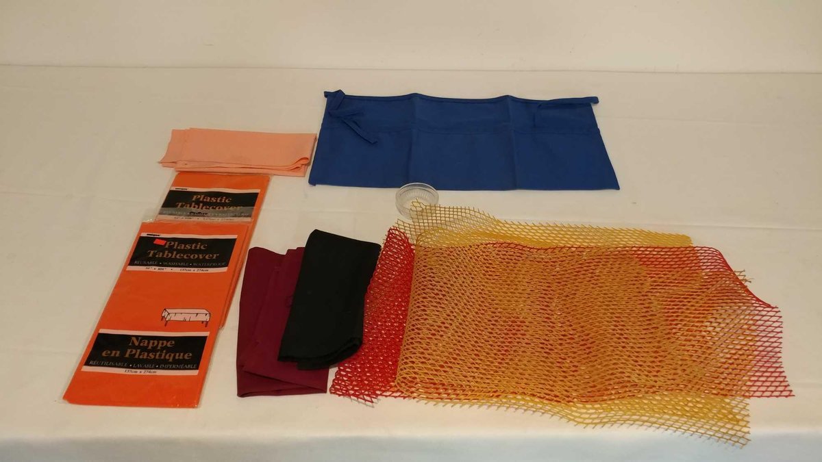 ASSORTMENT OF PLASTIC TABLE COVERS, DRYING MATS AND WAIST APRONS