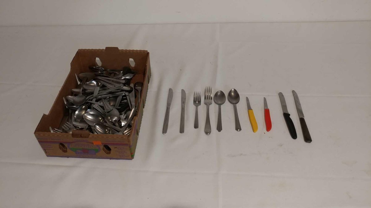 LARGE VARIETY OF STEAK KNIVES, BUTTER KNIVES, FORKS AND SPOONS