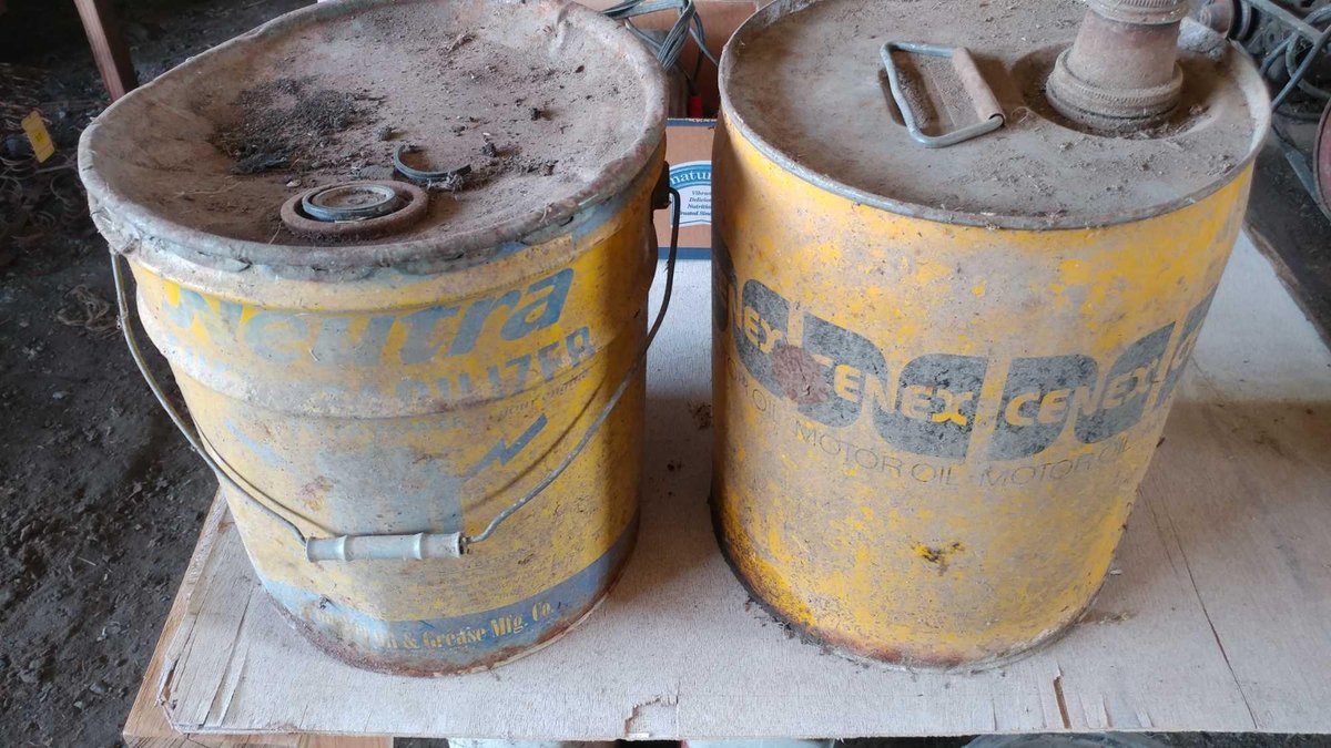 (2) VINTAGE METAL OIL CANS