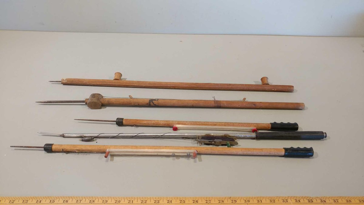 ASSORTMENT OF HAND LINE ICE FISHING SPIKE RODS