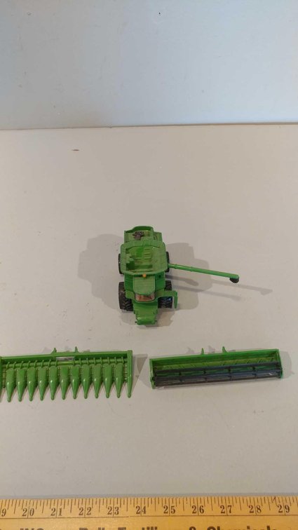 MODEL JOHN DEERE 9750STS W/ ATTACHMENTS