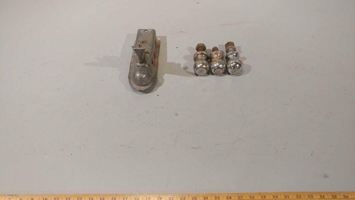 (I-197) (3) 1 7/8 TRAILER HITCH BALLS AND HITCH COUPLER