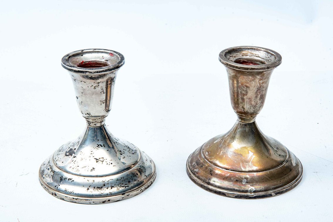 Two Weighted Sterling Towle Candlesticks