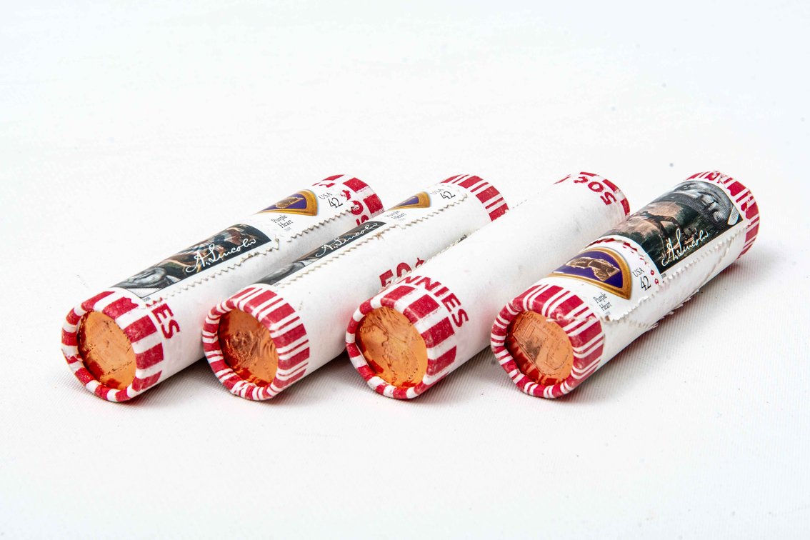 4 Rolls Uncirculated Lincoln Pennies.