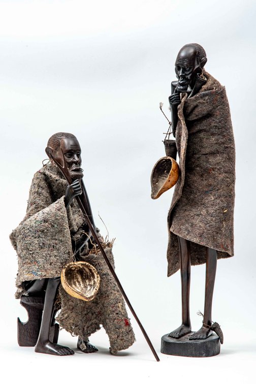 Pair of African Tribal Men Sculptures