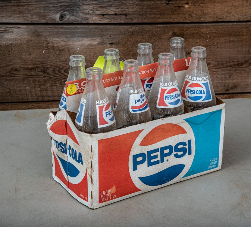 8 Pepsi 1/2 Liter Glass Bottles in Carrier