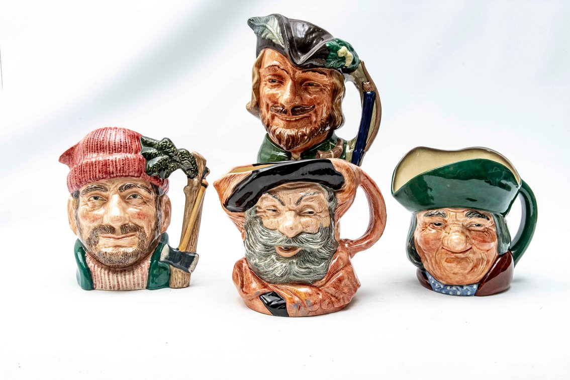 Four Royal Doulton Toby Jugs