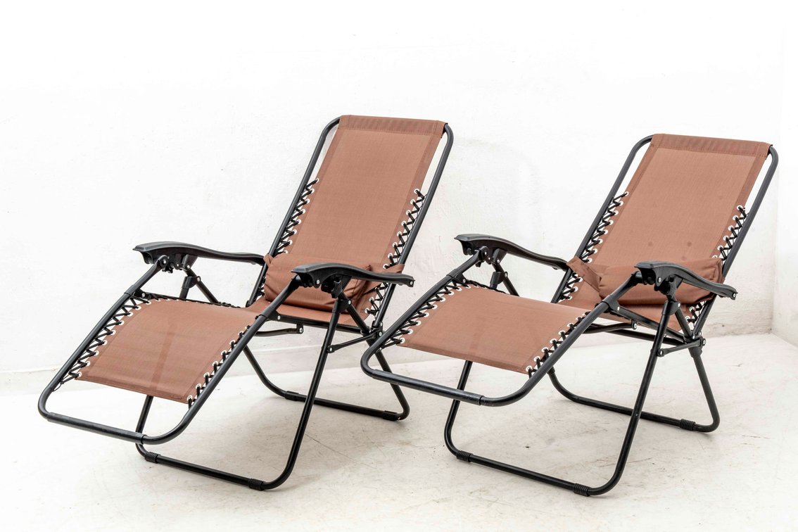 Pair of Matching Zero- Gravity Lounge Chairs