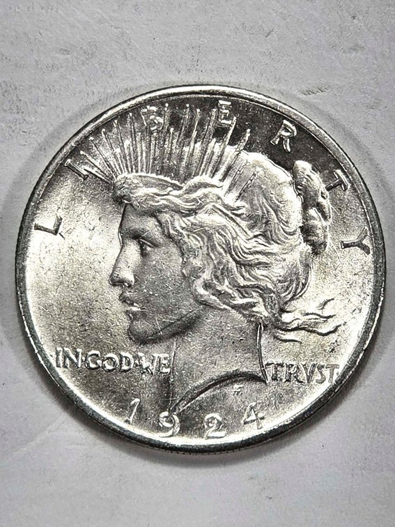1924 Peace Silver Dollar in Estimated AU Condition