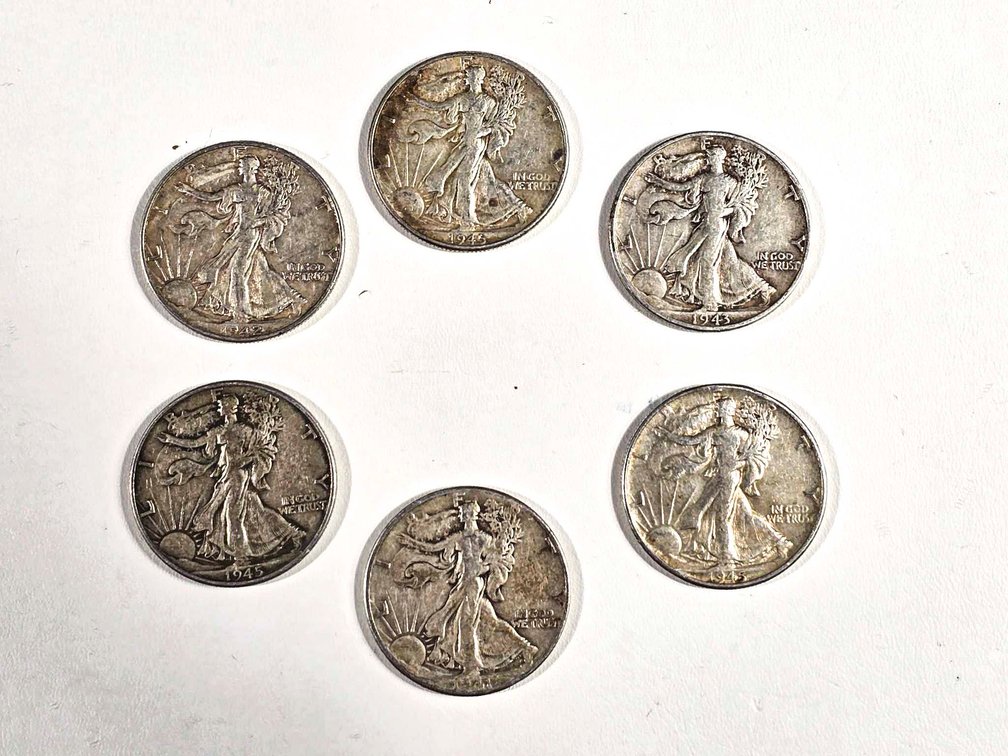 Six Walking Liberty Half Dollars