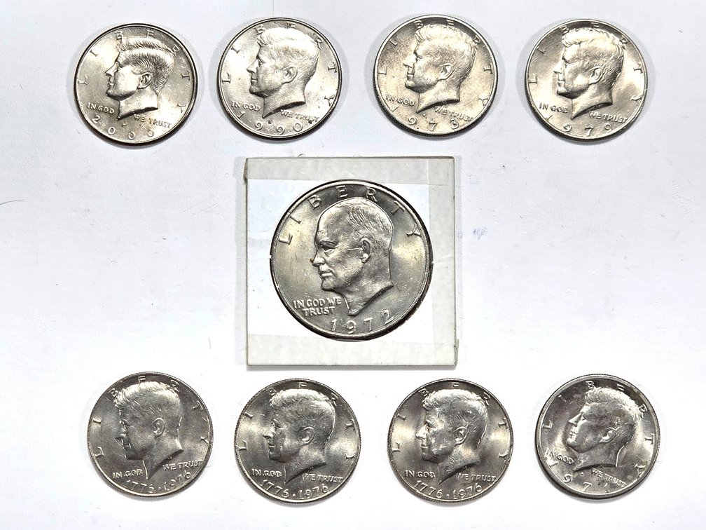 8 post 1970 Kennedy Half Dollars and 1 1972 Eisenhower $1 Coin