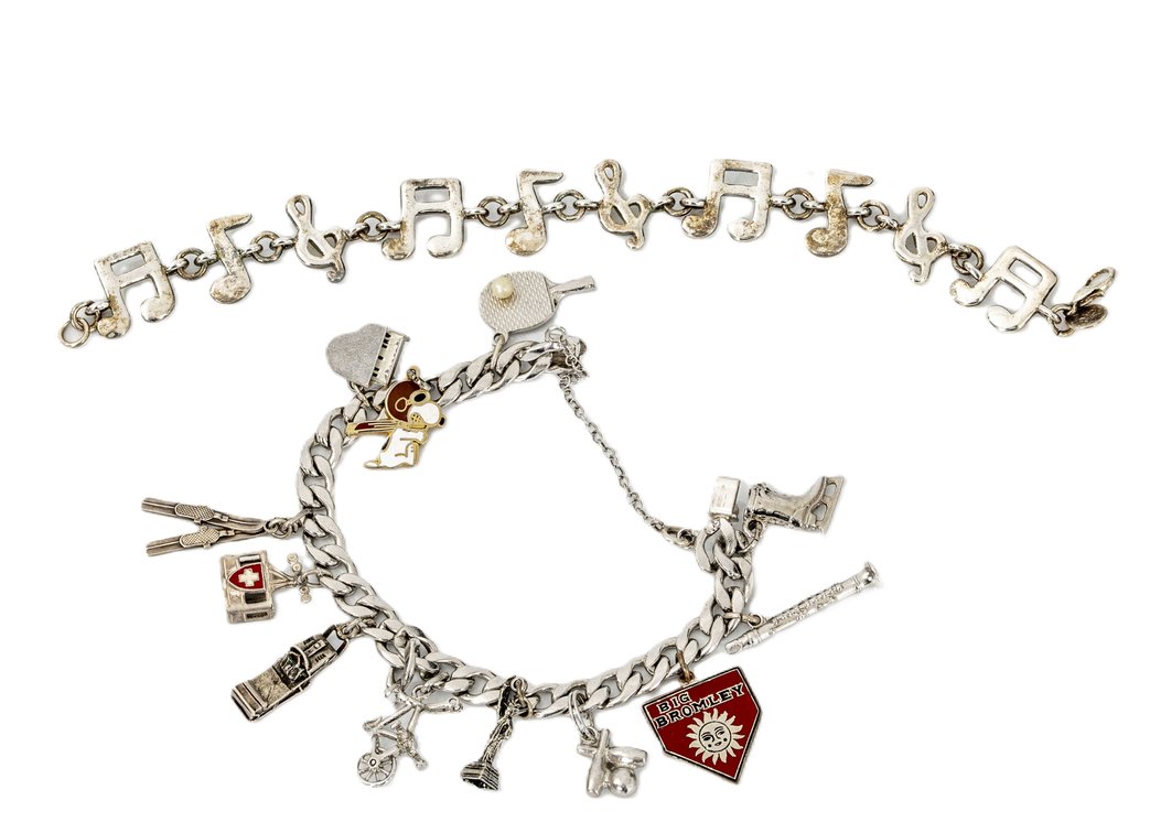 Two Sterling Charm Bracelets- 60.6 G