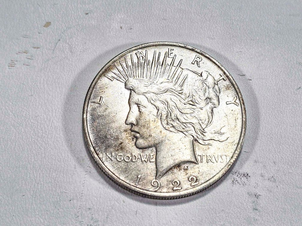 1922 Peace Silver Dollar Coin in Minimal Heat Expo