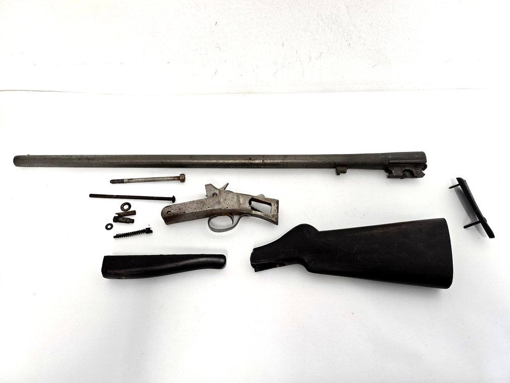 Disassembled H & R 12 ga Single shot shotgun