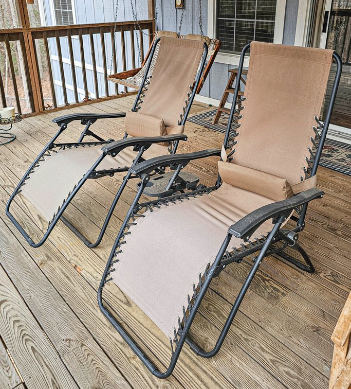 Two Zero Gravity Folding Lounge Chairs