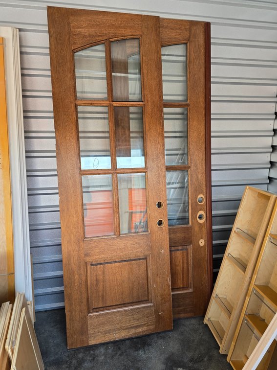 2 8' Doors with Beveled glass panes.