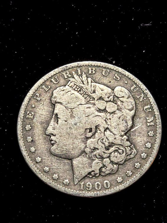 1900-O Morgan Silver Dollar in Estimated VG Condition