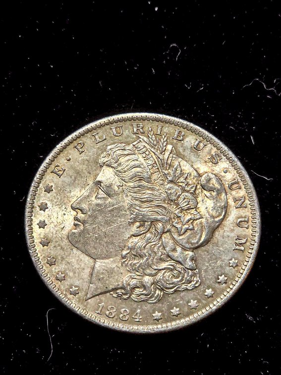 1884-O Morgan Silver Dollar Coin in Estimated AU Condition