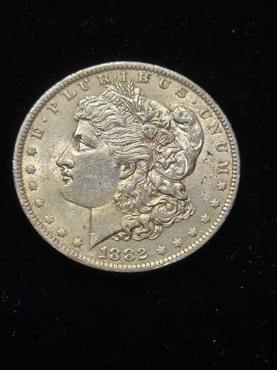 1882-O Morgan Silver Dollar in Estimated AU Condition