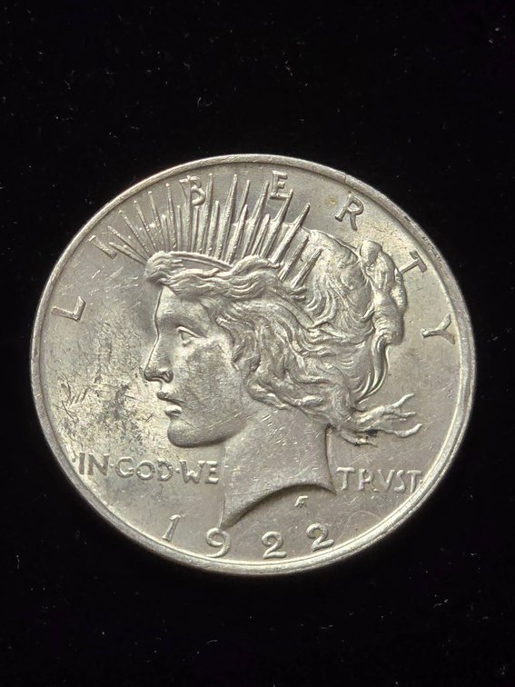 1922 United States Peace Silver Dollar Coin in Estimated AU Condition
