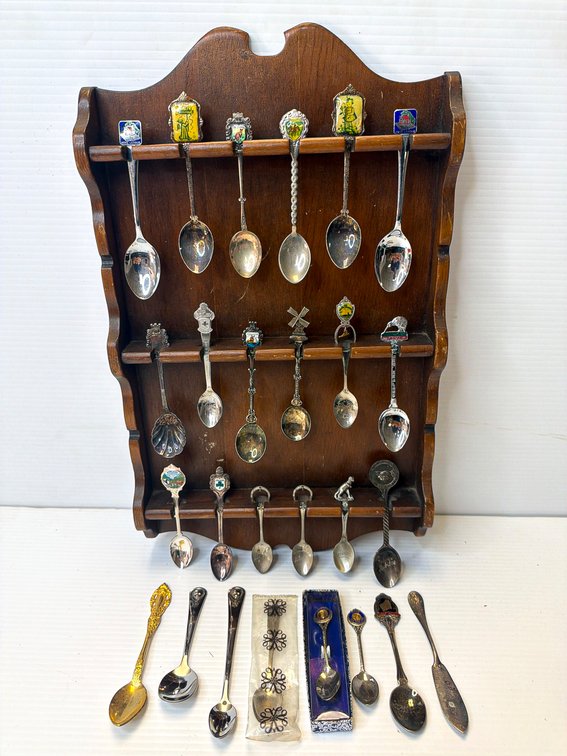 Display with Assorted Souvenir Spoons