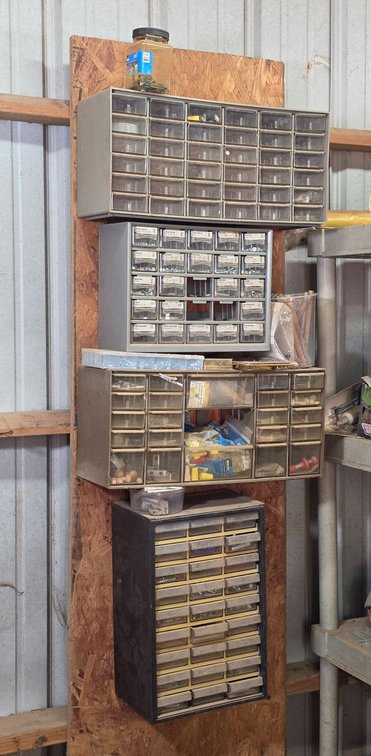 Stacked Metal Drawer Cabinets With Hardware Contents