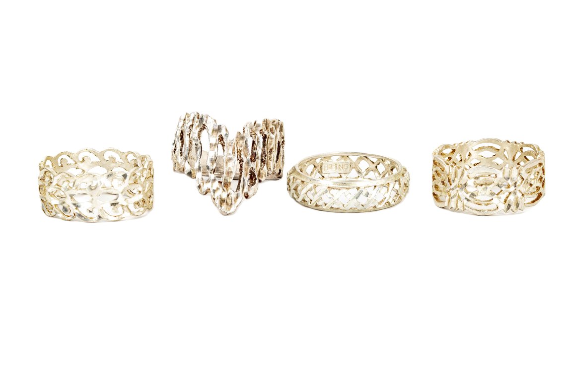 Four Pierced Sterling Rings- 12.7
