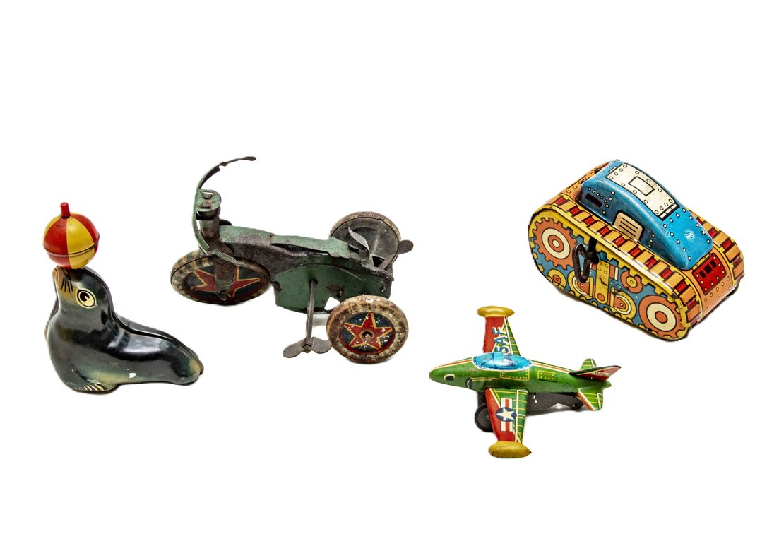 4 Different Tin Litho Toys