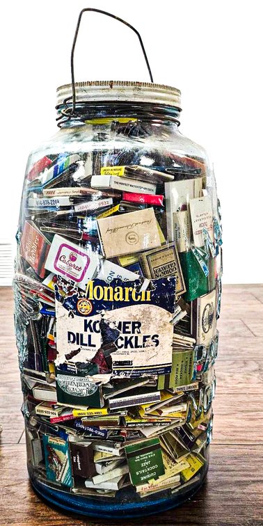 Large Mason’s Pickle Jar Filled With Matchbooks