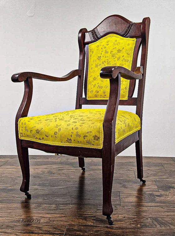 Antique Wooden Armchair With Yellow Upholstery and Casters
