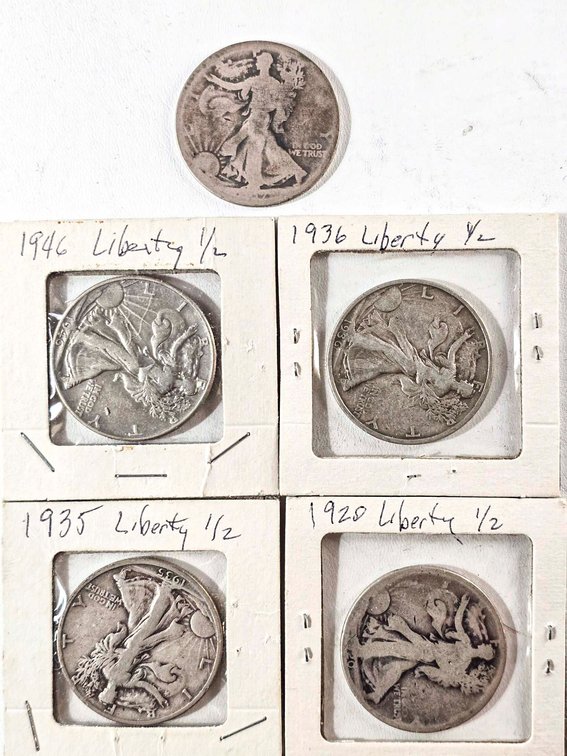 Five Walking Liberty Half Dollars from 1917, 1920, 1935, 1936, and 1946