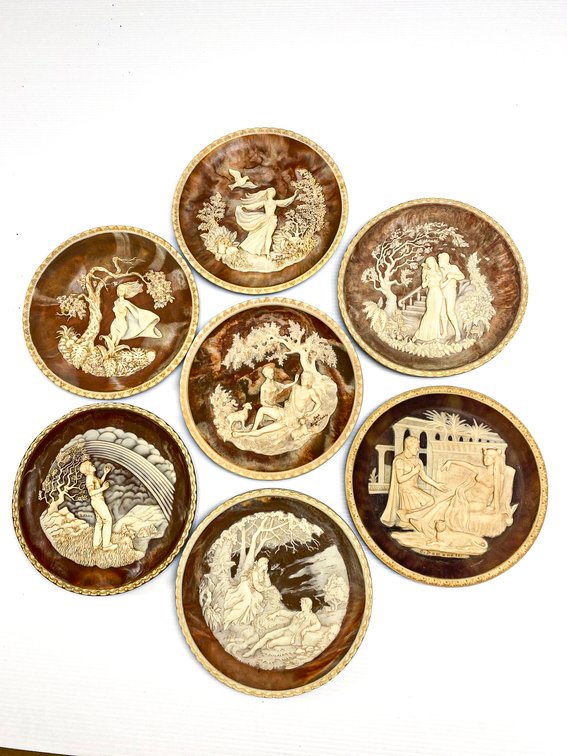 Seven Sculpted Incolay Plates