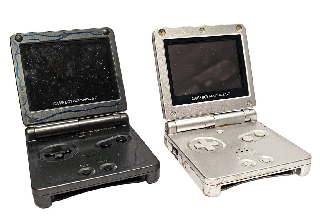Nintendo Game Boy Advance SP Handheld Consoles in Black and Silver