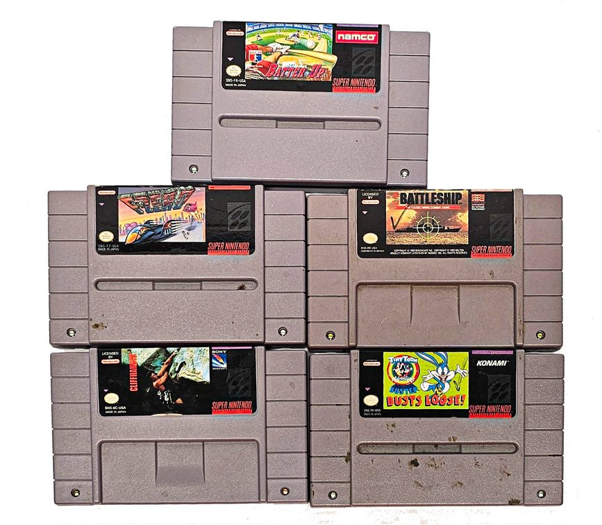 Five Super Nintendo Entertainment System (SNES) Game Cartridges