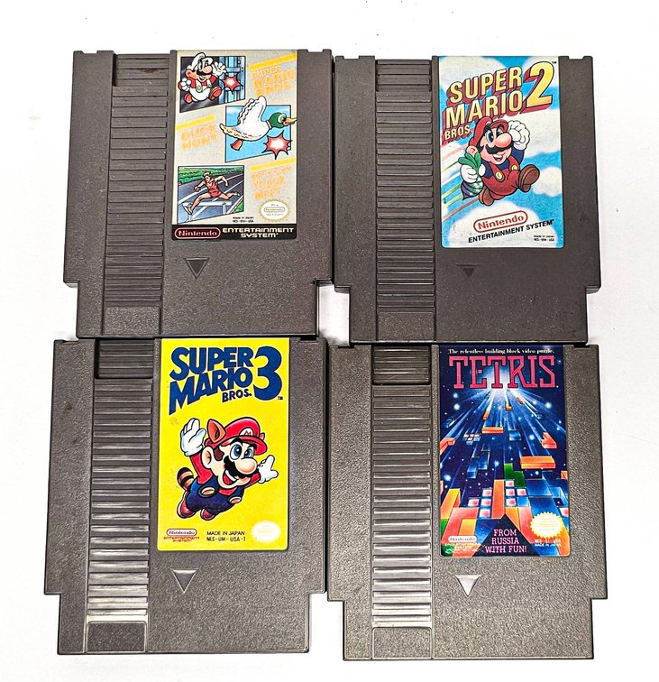Four Nintendo (NES) Game Cartridges – Mario, Tetris, etc.