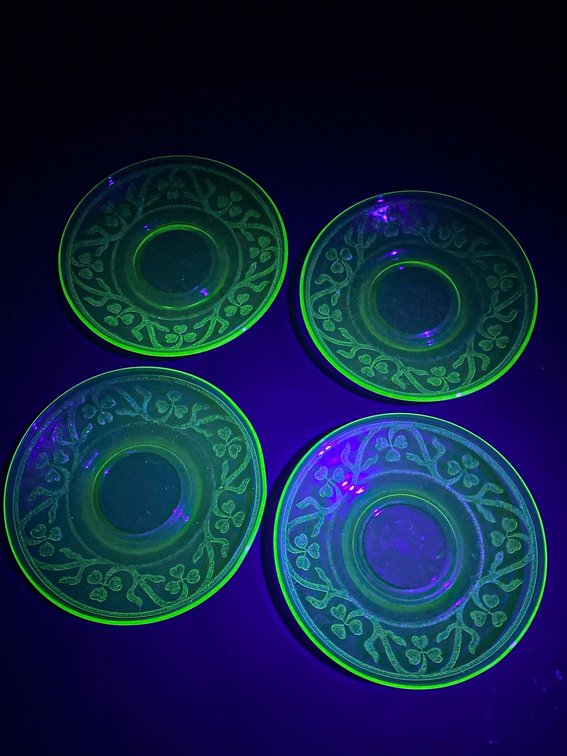 Four Uranium Glass Saucers with Three-Leaf Clover Pattern
