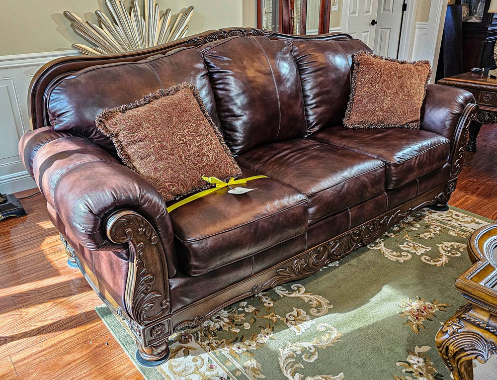 Ashley Furniture Brown Leather Arched 3-Seat Sofa
