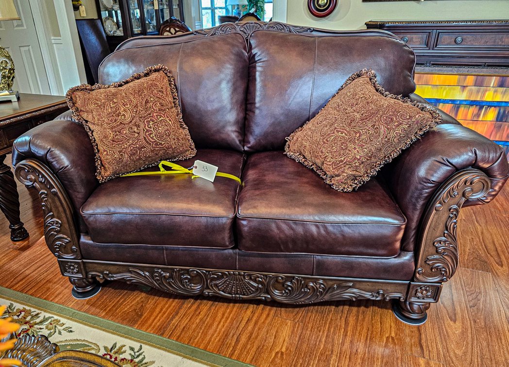 Ashley Furniture Brown Leather 2-Seat Sofa