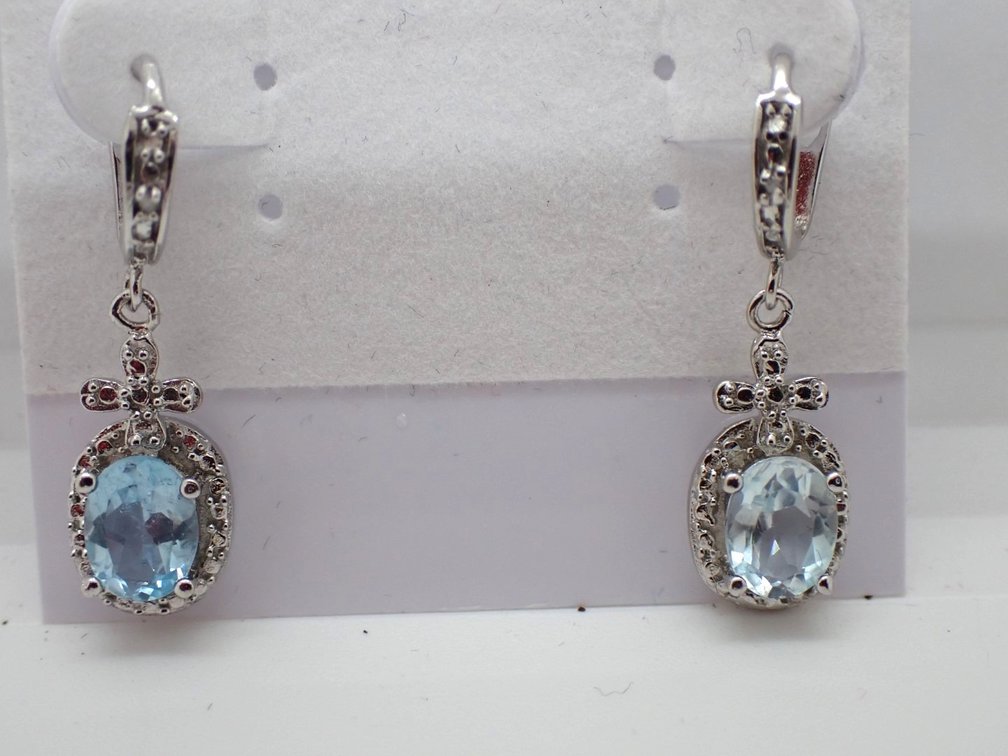 Sky Blue Topaz Dangle Earrings