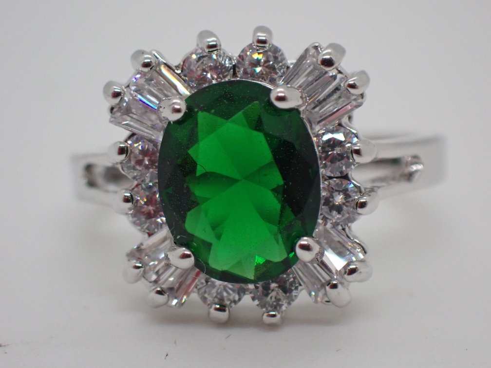 Oval Cut Emerald with Cubic Zirconia Ring