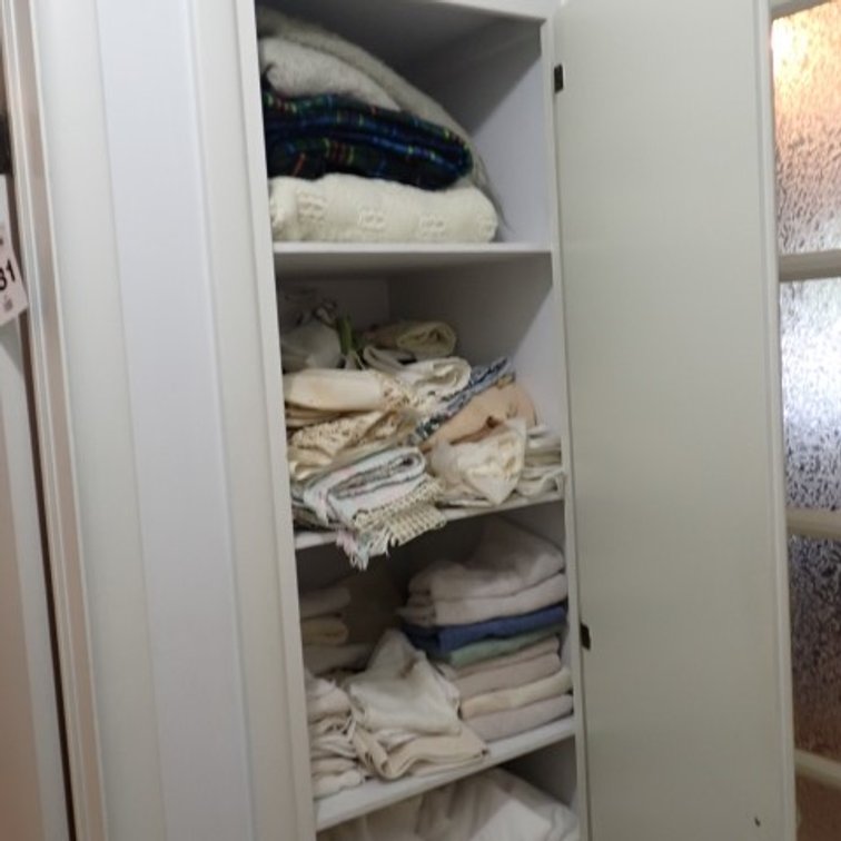 Linen Closet with Handwork