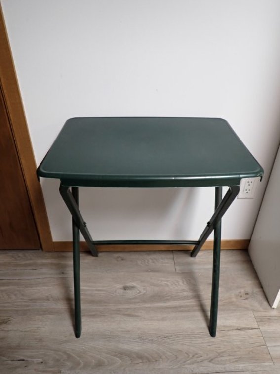Green plastic foldable table