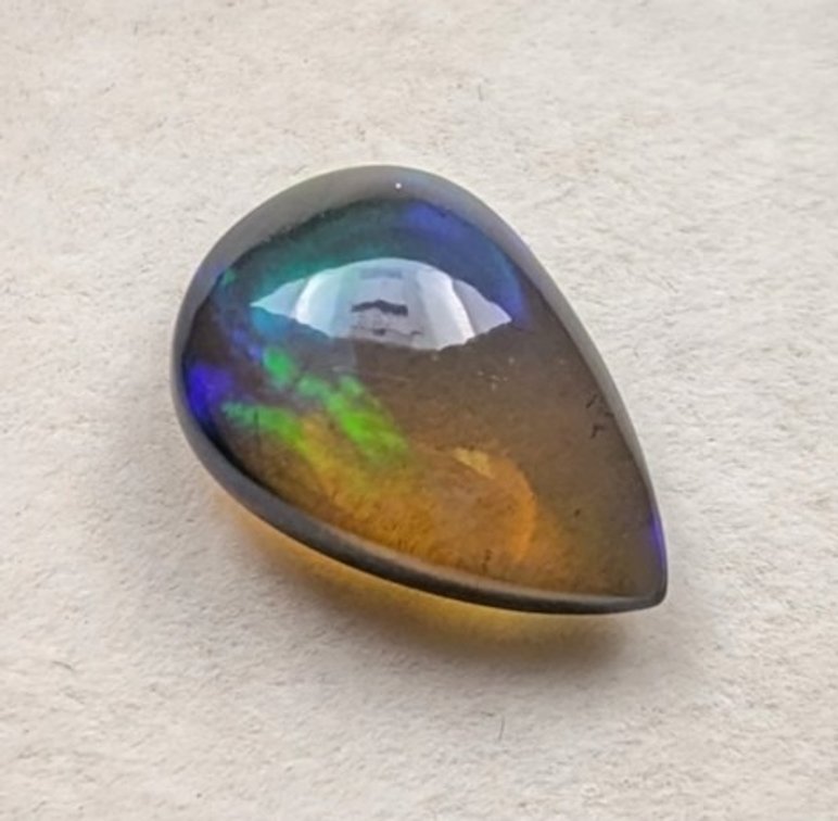 2.86 ct Certified Black Opal gemstone ($1,787 Appraisal)