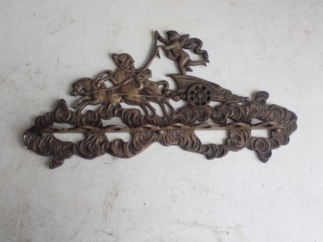 Image for Brass Rack Looks to be for Pipes