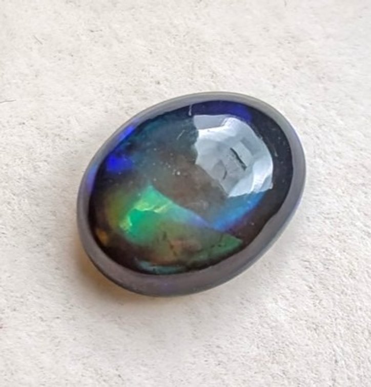 3.85 ct Certified Black Opal gemstone ($2,887 Appraisal)
