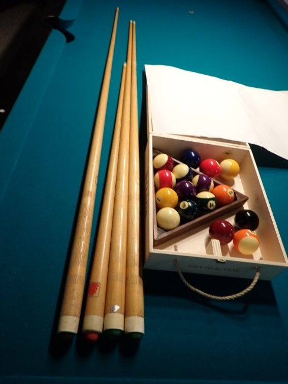 Triangle and Cues and Billiard Balls