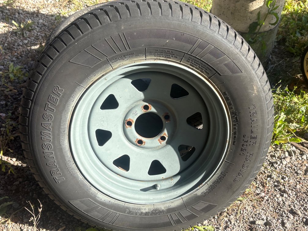 Three 5 bolt trailer rims & tires