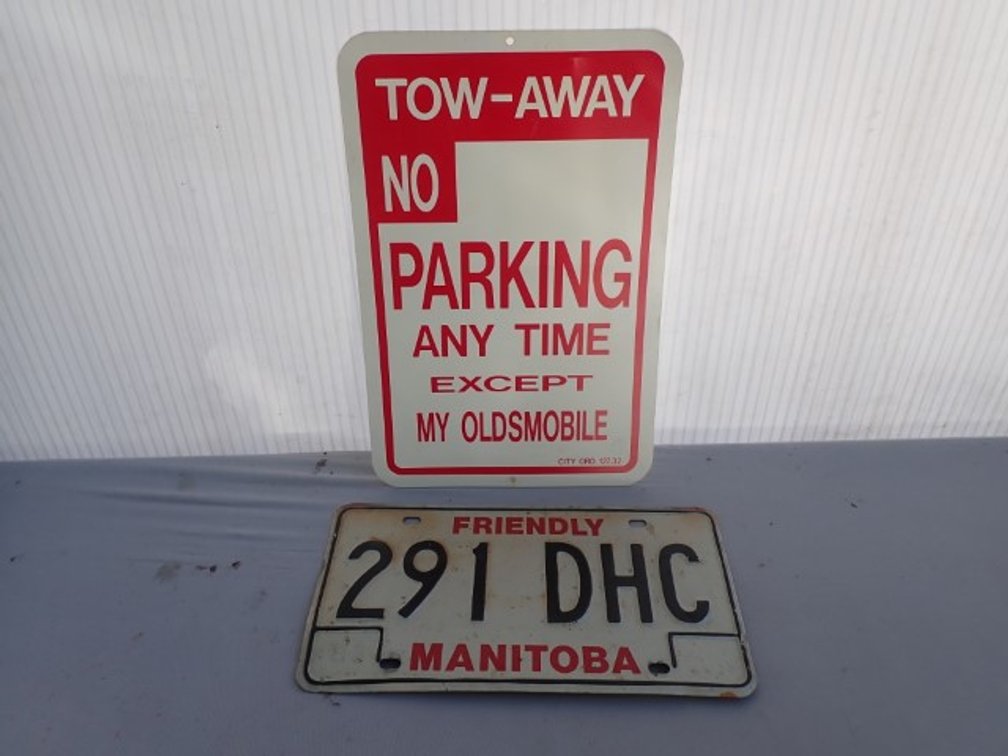 Vintage Manitoba Licence Plate and Oldsmobile Only Parking Sign
